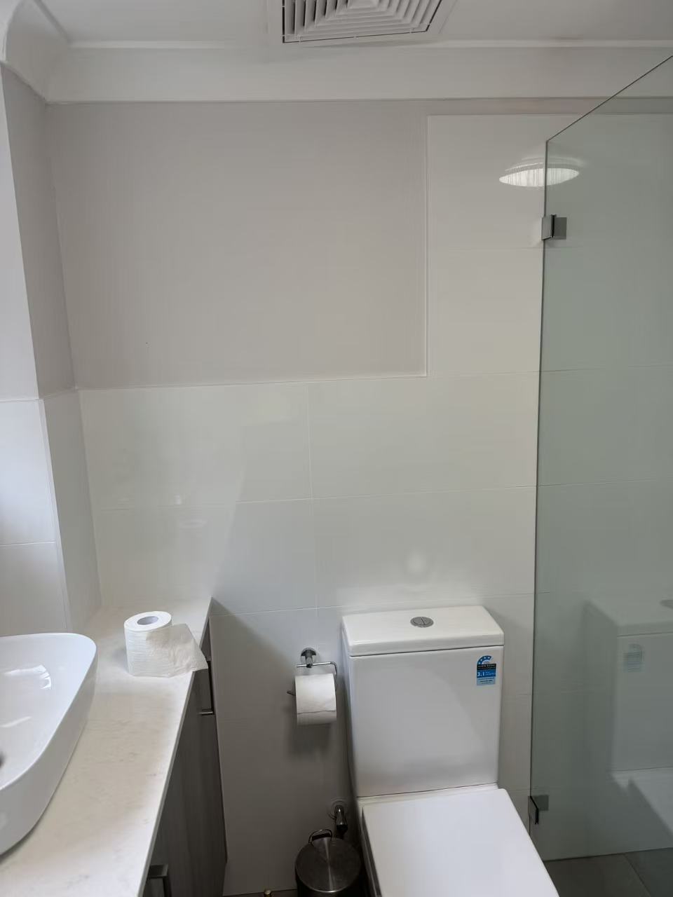 Modern toilet and tiling finish in Hurstville bathroom