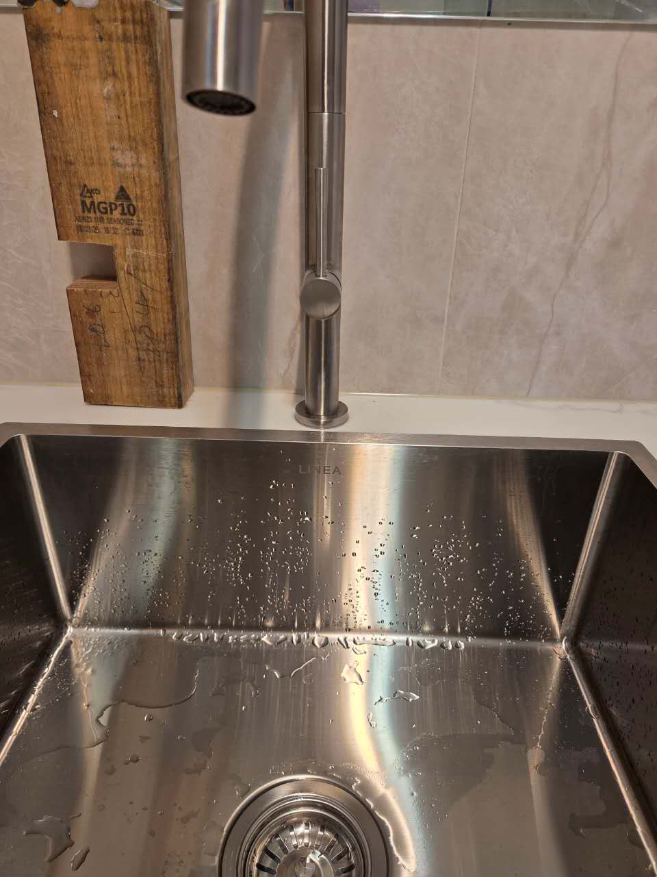 Linea stainless steel laundry sink installed in Sylvania Waters renovation